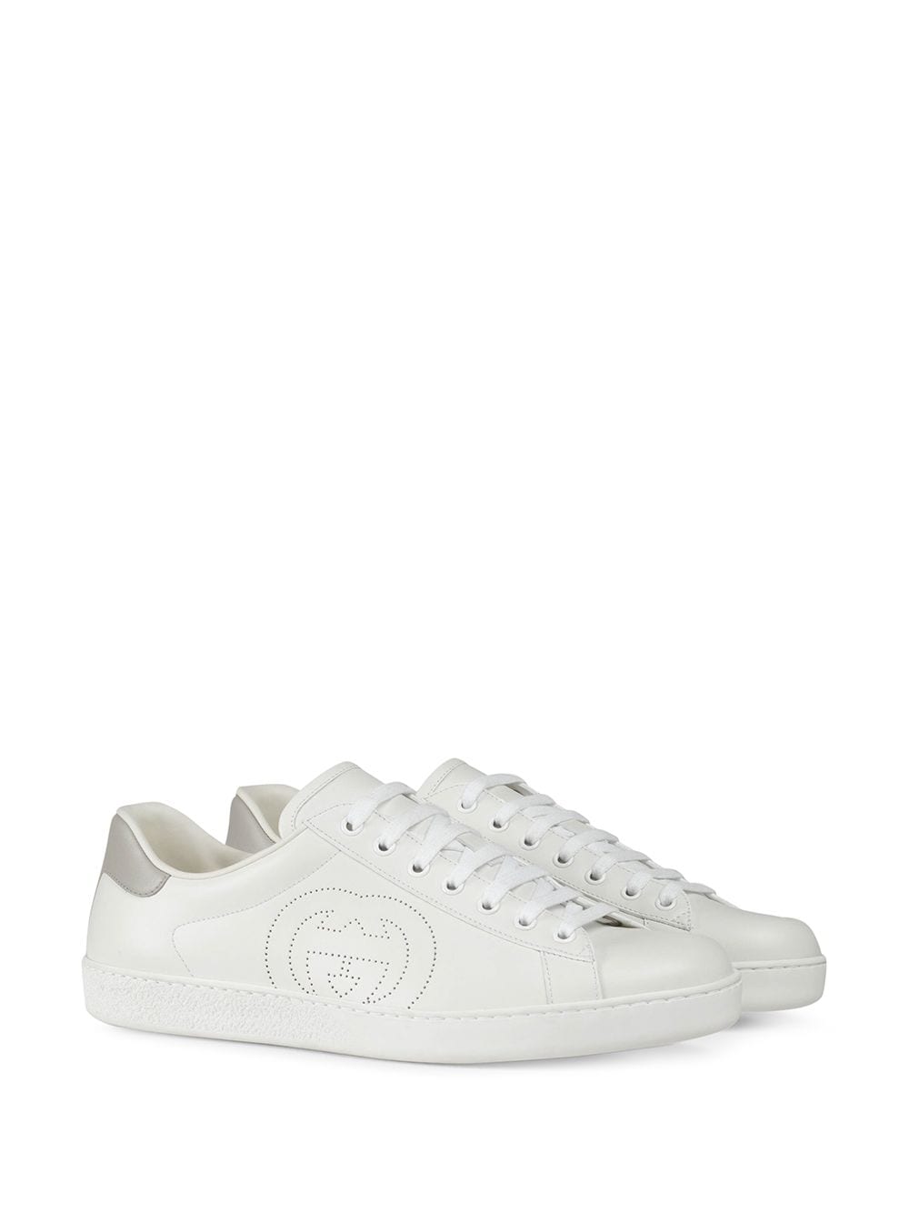 zapatillas Gucci con logo perforado