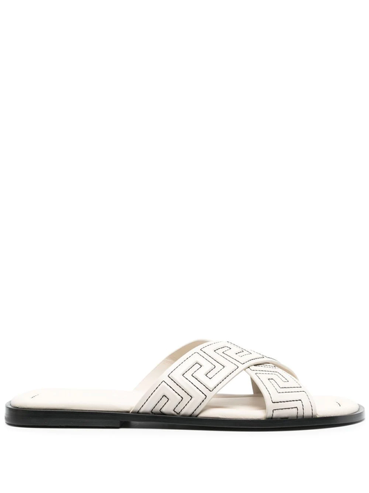 Versace sandalias con tiras cruzadas en relieve Greca