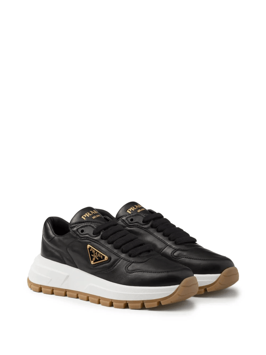 Prada triangle-logo plaque black gold leather sneakers