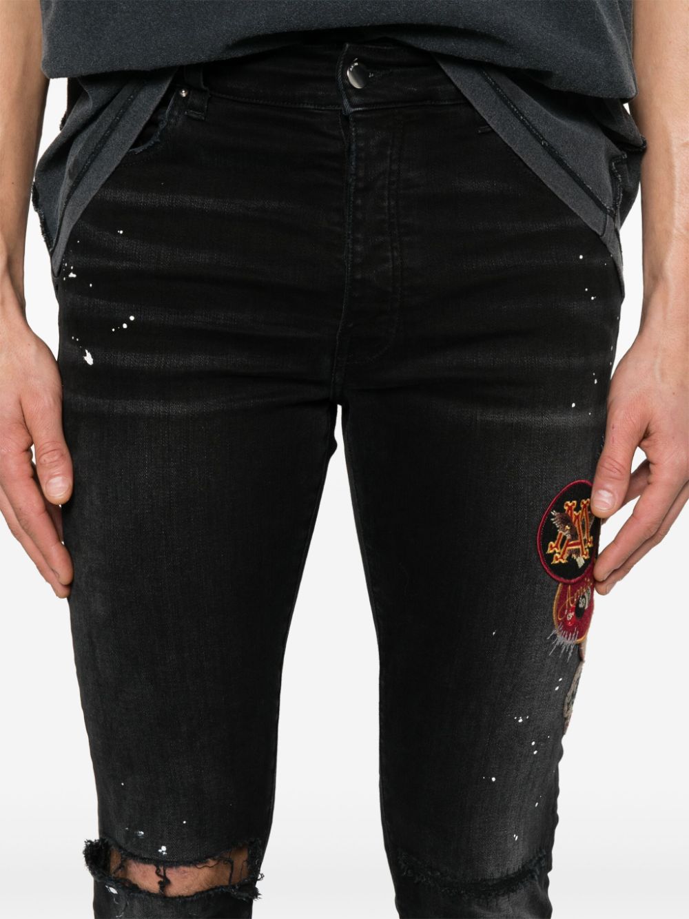 AMIRI patch-detailing skinny jeans