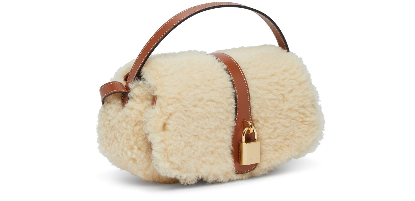 CELINE Clutch on strap in shearling and calfskin bag