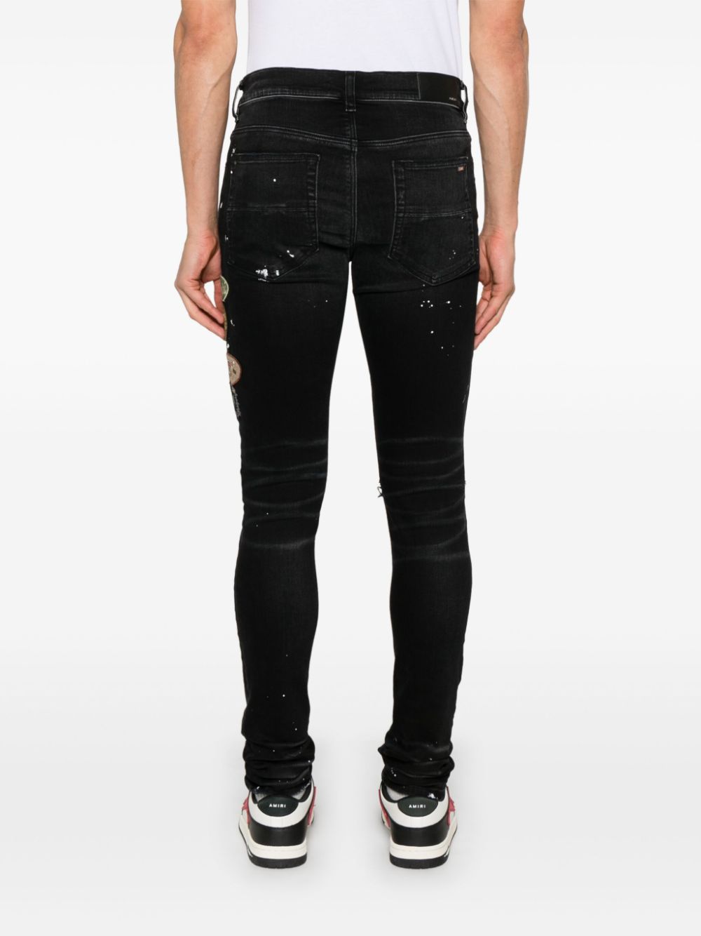 AMIRI patch-detailing skinny jeans