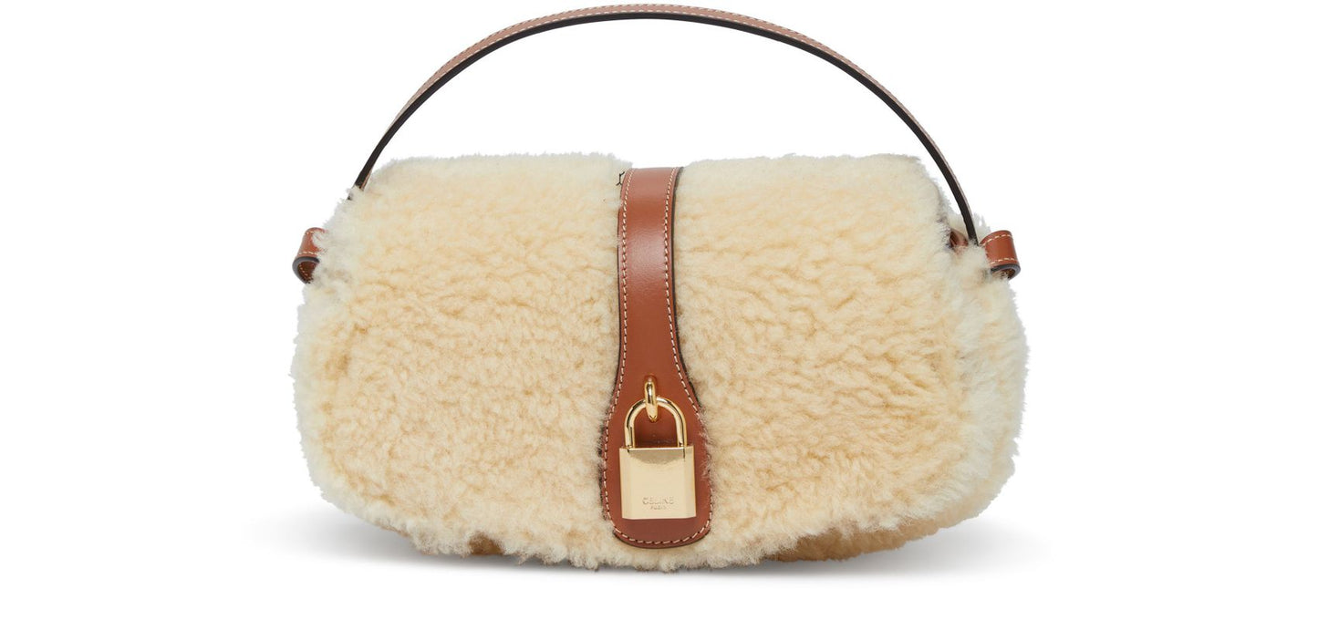 CELINE Clutch on strap in shearling and calfskin bag