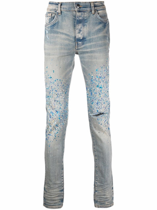 AMIRI paint-splatter detail denim jeans