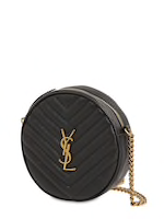 YSL Yves SAINT LAURENT BOLSO CÁMARA REDONDO DE VINILO DE PIEL ACOLCHADA